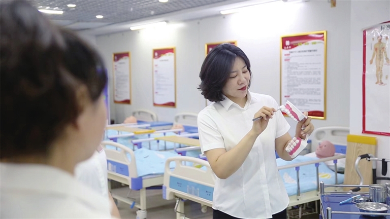 周婕：女承父业守初心 扎根一线服务民生担使命